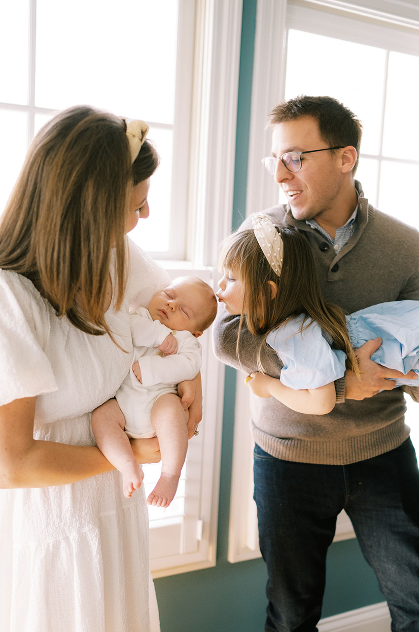 Jen Herrmann holding her daughter