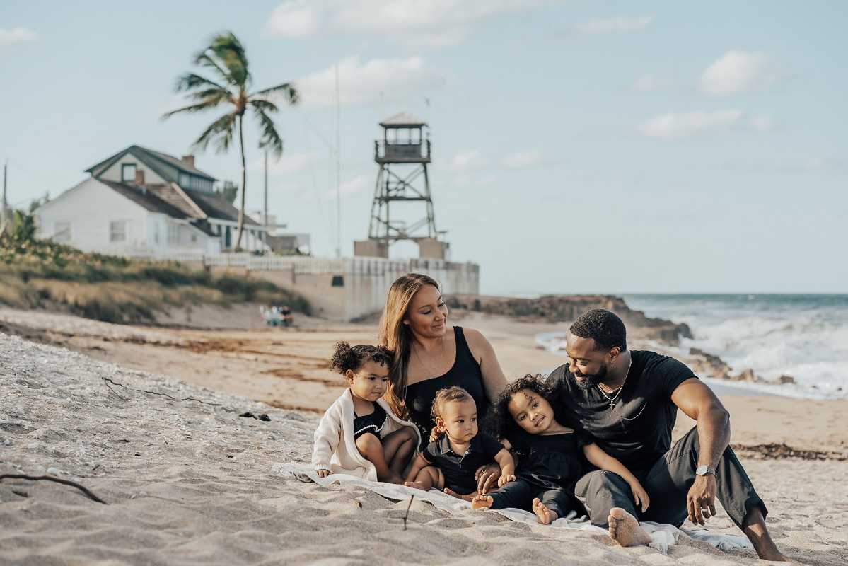 The Harvey family plays on the beach